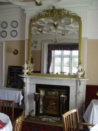 Original fireplace in main dining room (Maryport through the ages)